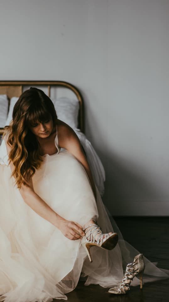 Girl Putting on Shoe Wedding Portraits