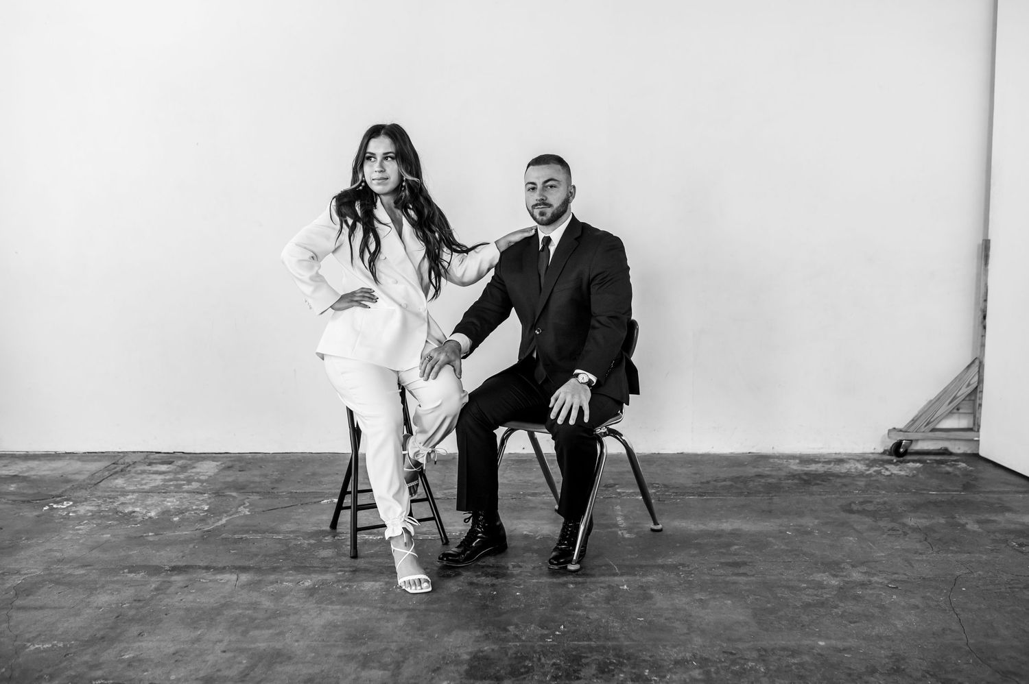 Engaged man and woman in Houston photography studio.