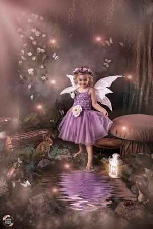 Magical fairy scene with purple dress and wings beside a glowing lantern in an enchanted forest.