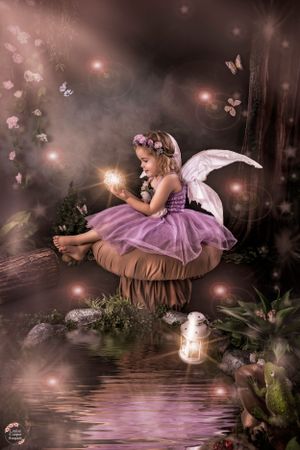 Fairy photoshoot with glowing lantern and purple dress in a mystical woodland setting.