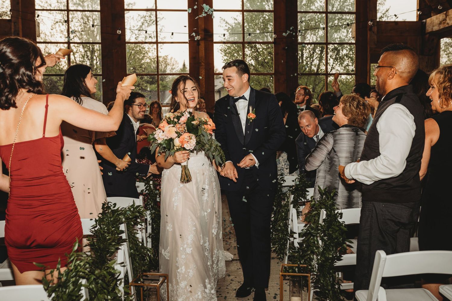 Bride and groom wedding ceremony eucalyptus petal at Le Pont Couvert