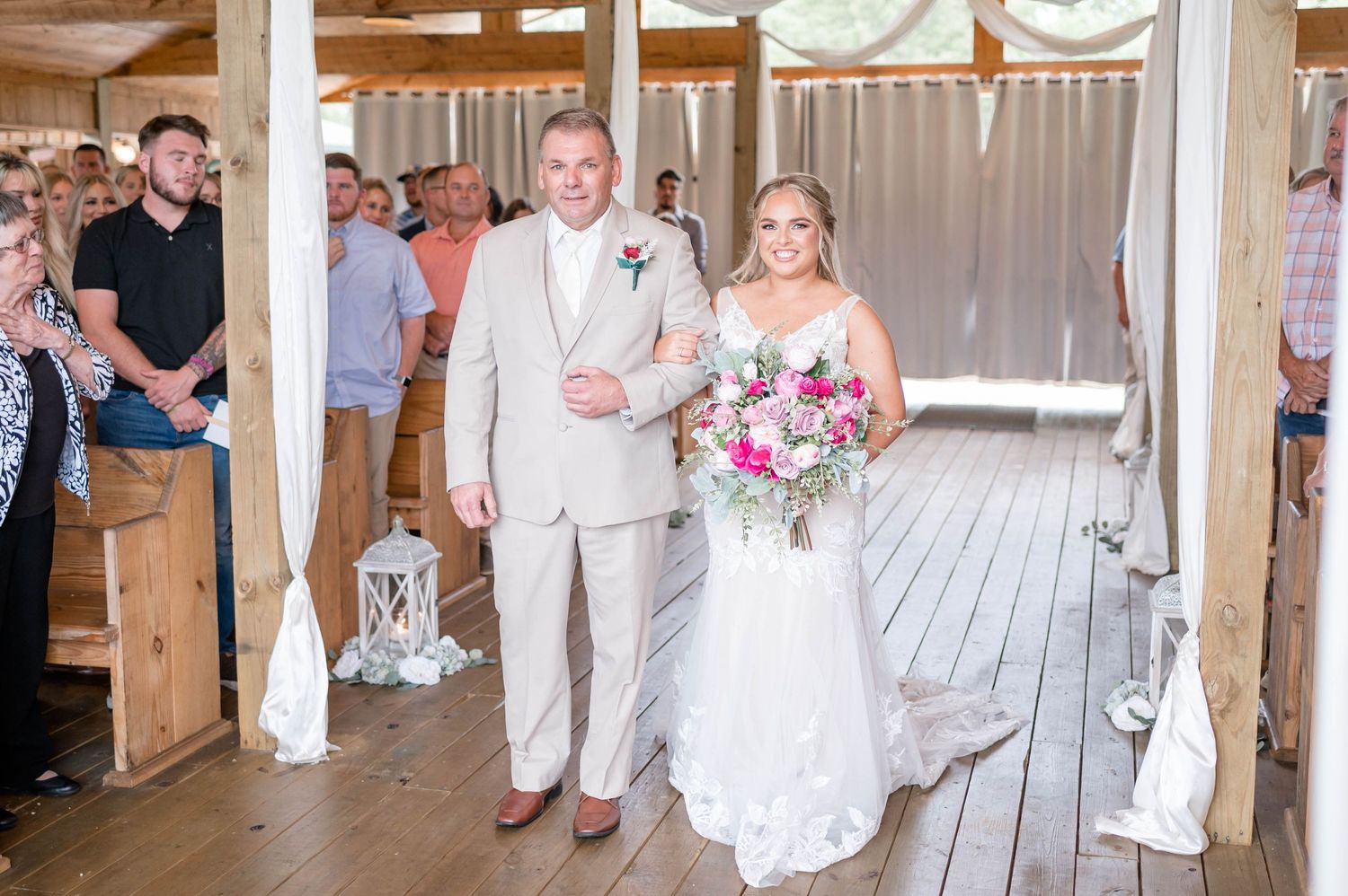 bride and her dad walking down the aisle