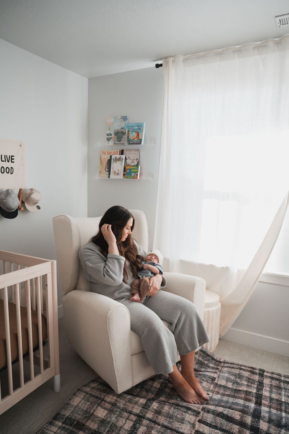 A new mom enjoys the first few weeks with her baby as captured in this stunning newborn photoshoot.