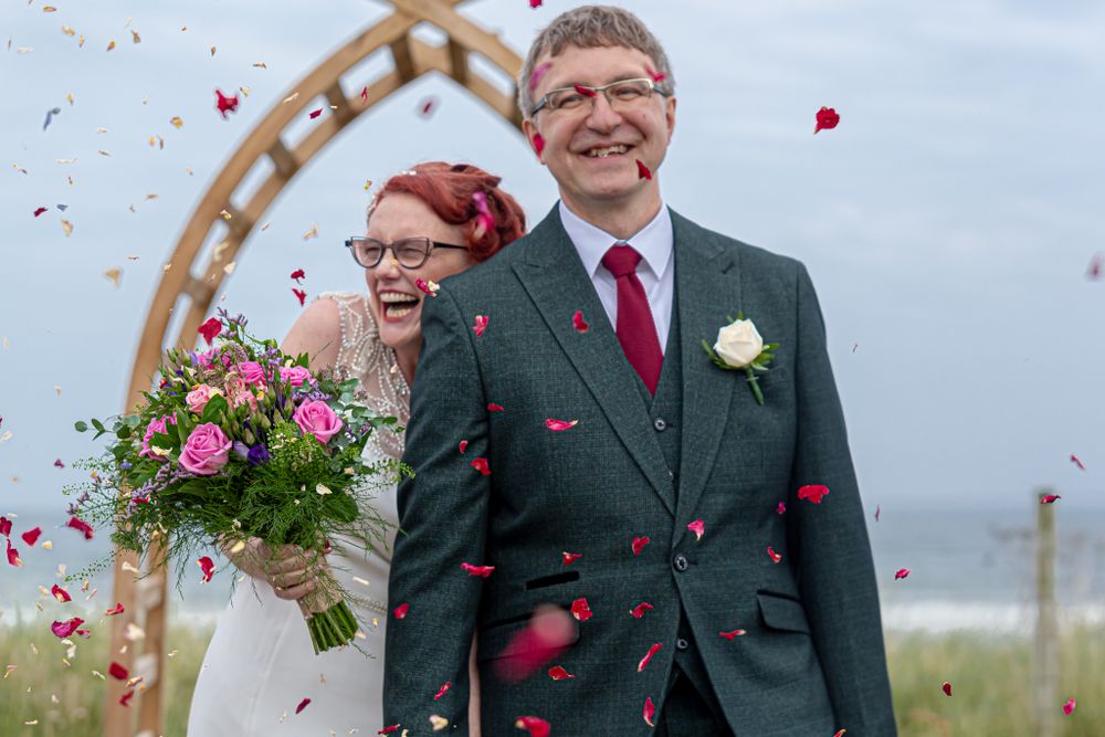 Confetti and Couple, Beach Wedding, Wedding Photogaphy
