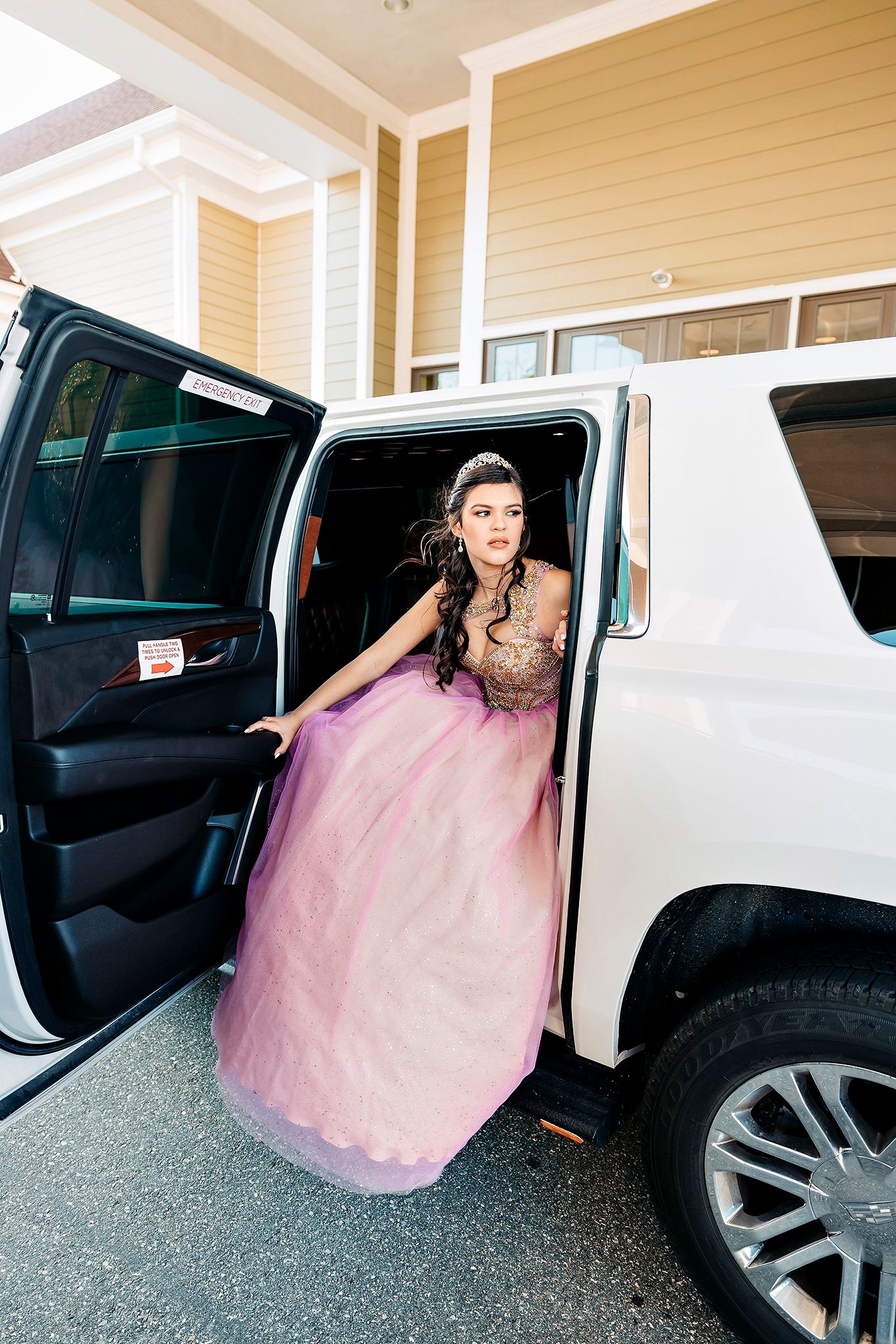 A sequence of photos showing someone in a pink ball gown getting into a white SUV.
