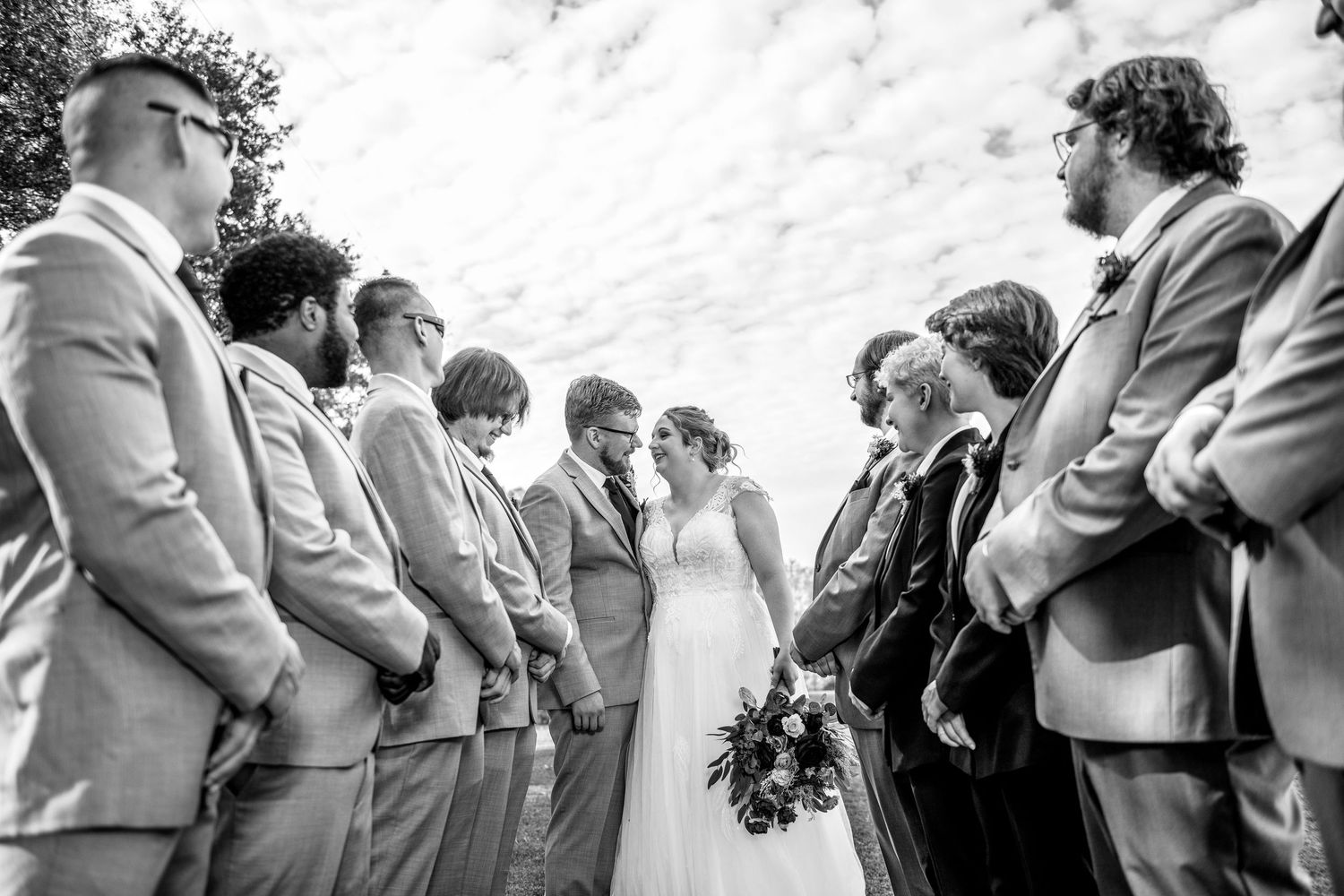Black and white wedding ceremony photography showing emotional intimate moments.