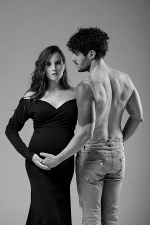 Monochrome couples maternity photo showing intimate moment and connection.