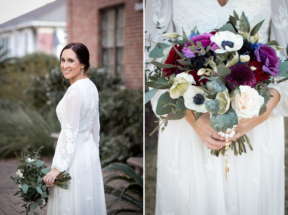 Close-up details of bridal bouquet with purple and white flowers against white dress.
