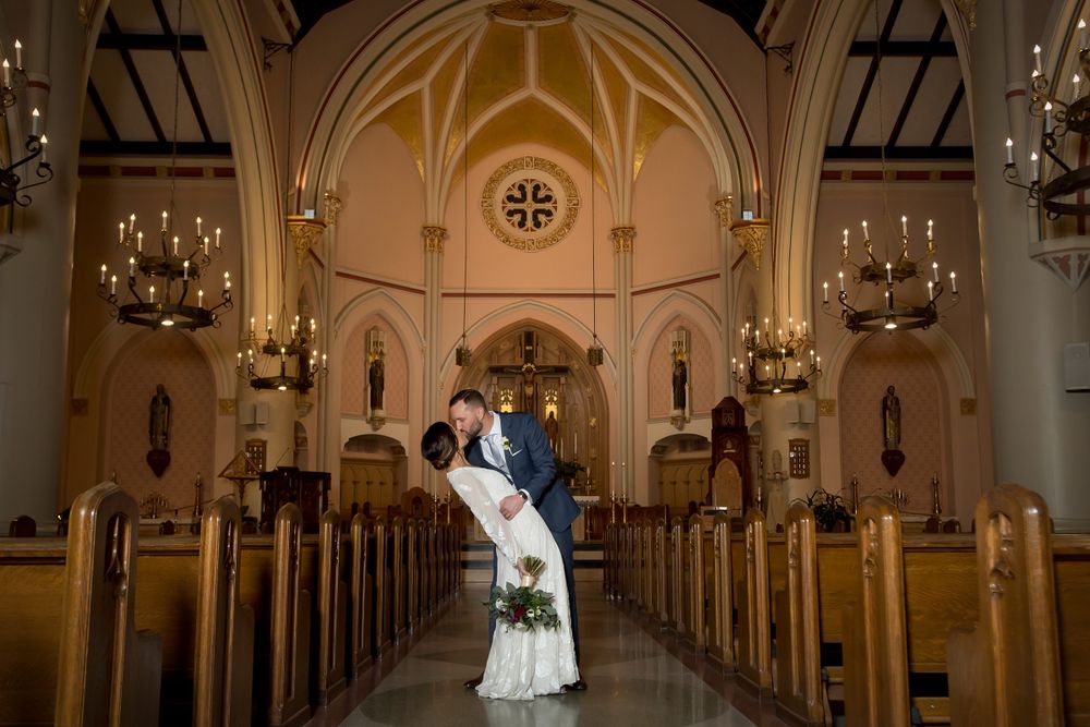 Cathedral interior with dramatic lighting and gothic architectural details.