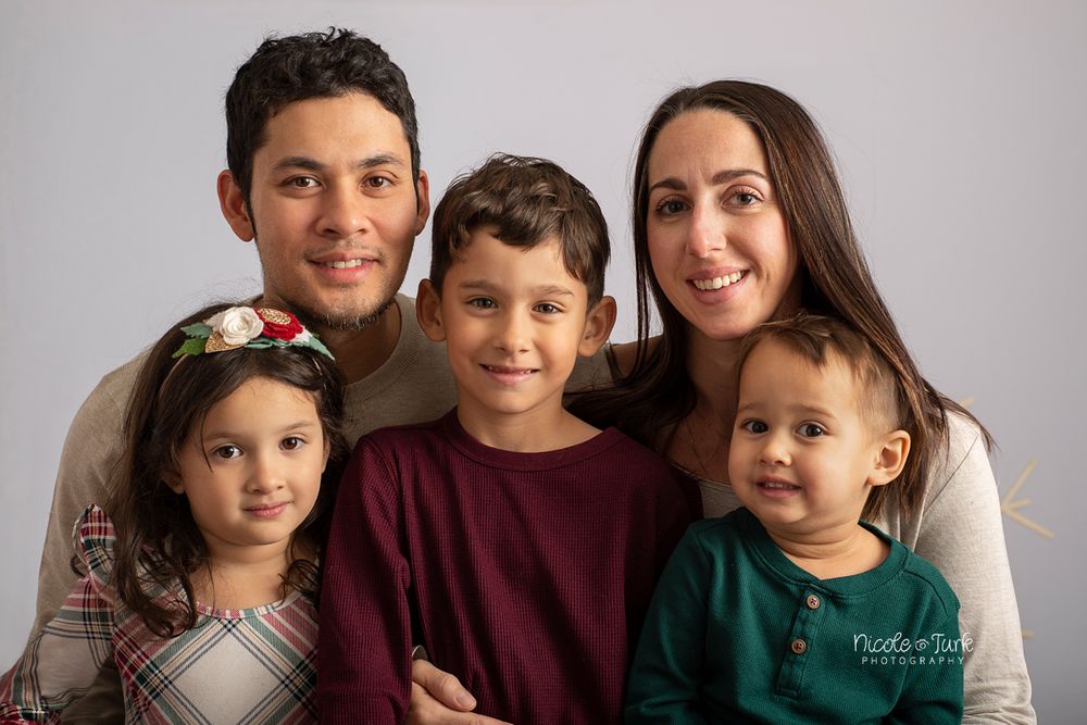 In studio posed family photography, located in Clarington.