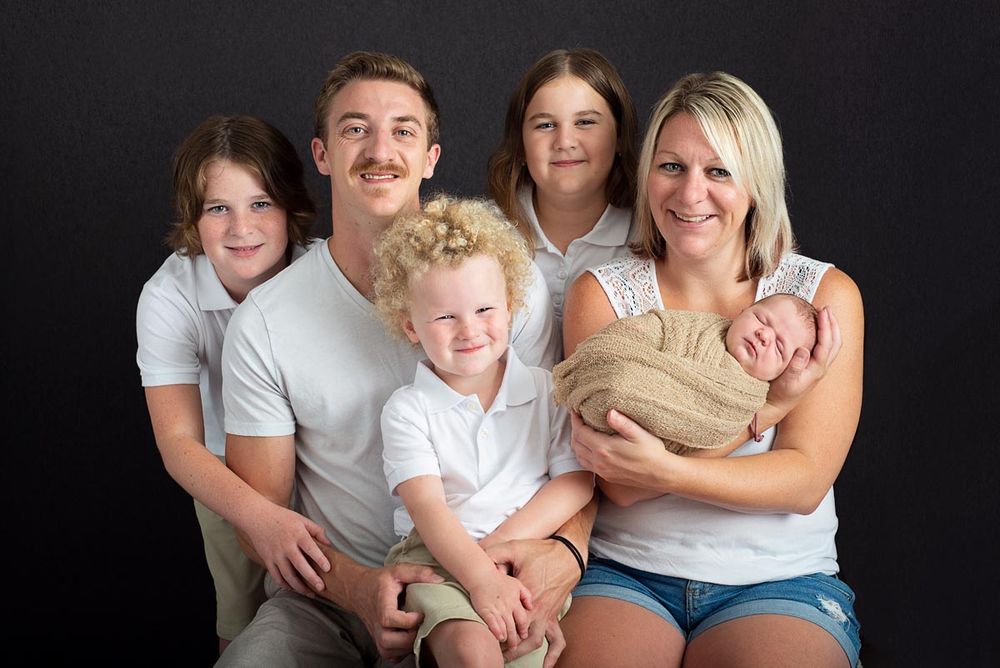 Posed in studio family photography with newborn baby, Bowmanville
