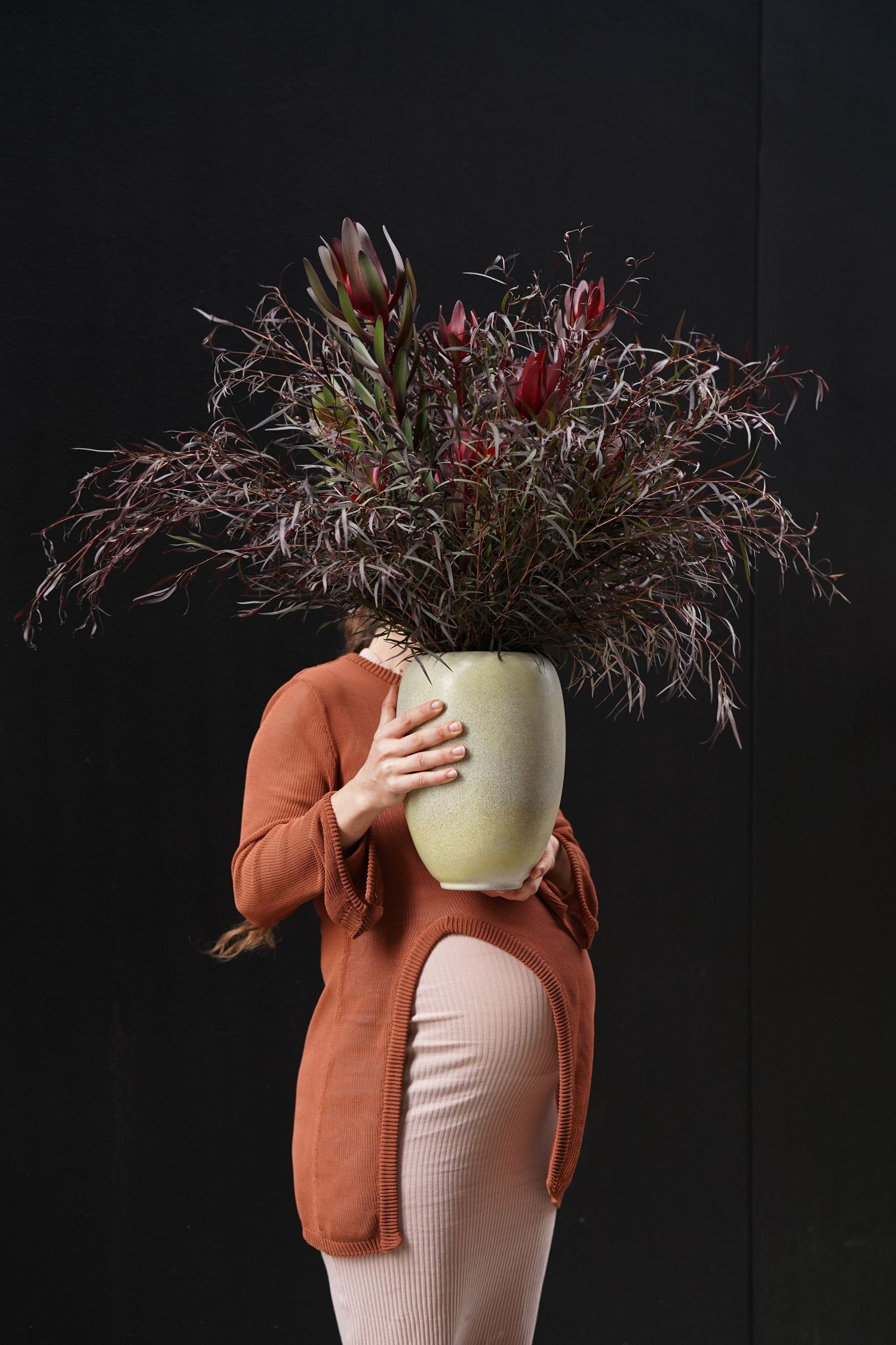 Sanetra Longno photo of Serracinna co-owner Leah Pipe Meltzer holding beautiful wedding florals - Proper Hotel wedding