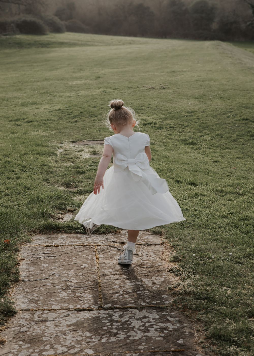 flower girl dancing a St Elizabeth's house wedding