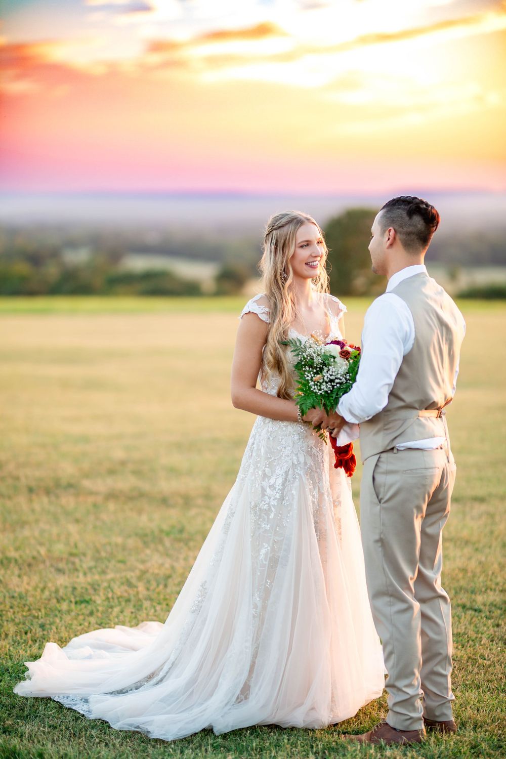 Bride and groom at sunset in a field in Northwest Arkansas, by Michele McCoy Photography.