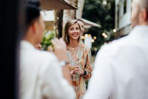 Capturing candid moments of people smiling and laughing during wedding day