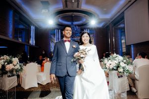 Couple walk-in during their big day of wedding