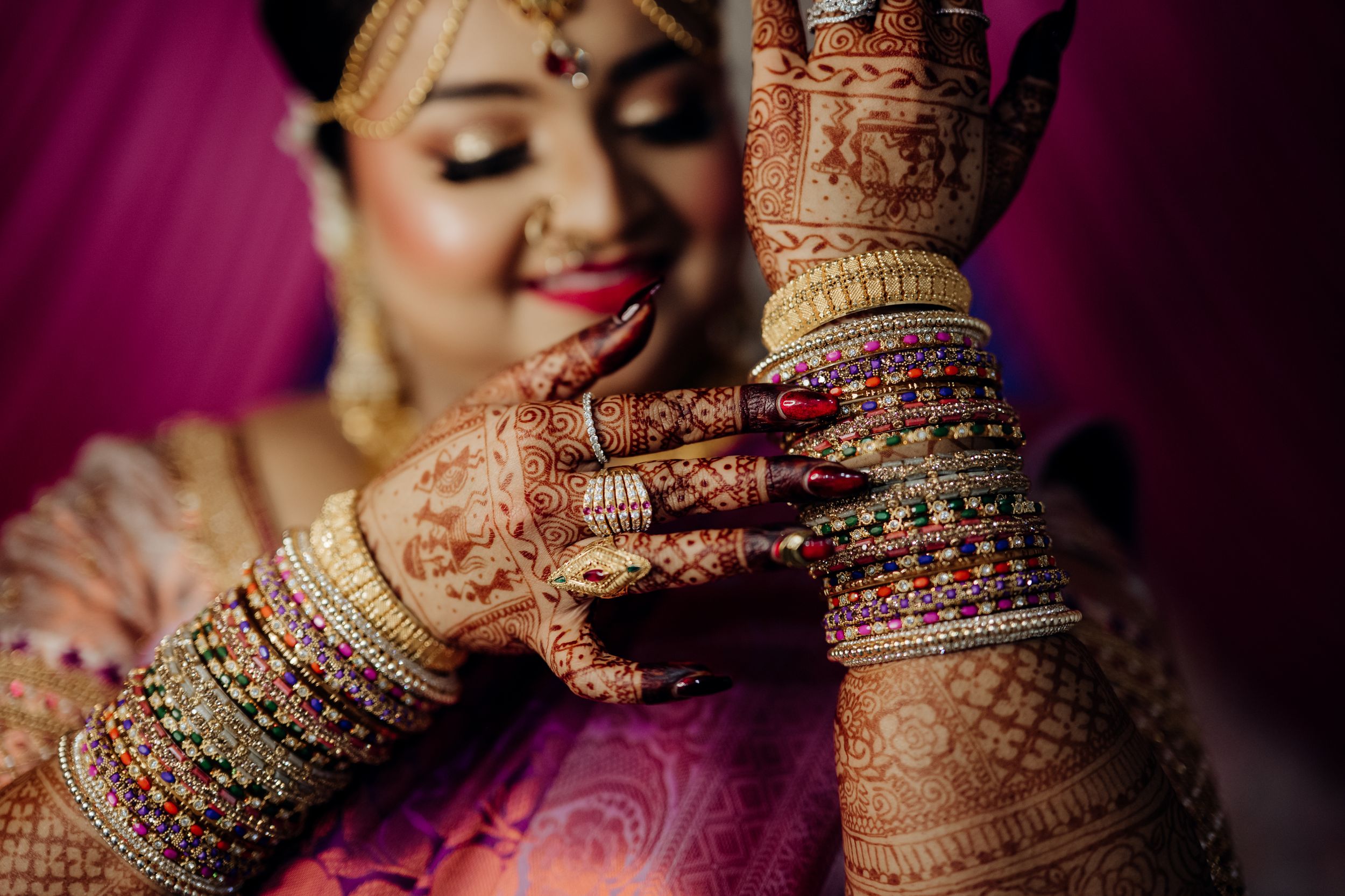 Wedding portrait of Bride Adjusting her bangles during wedding day