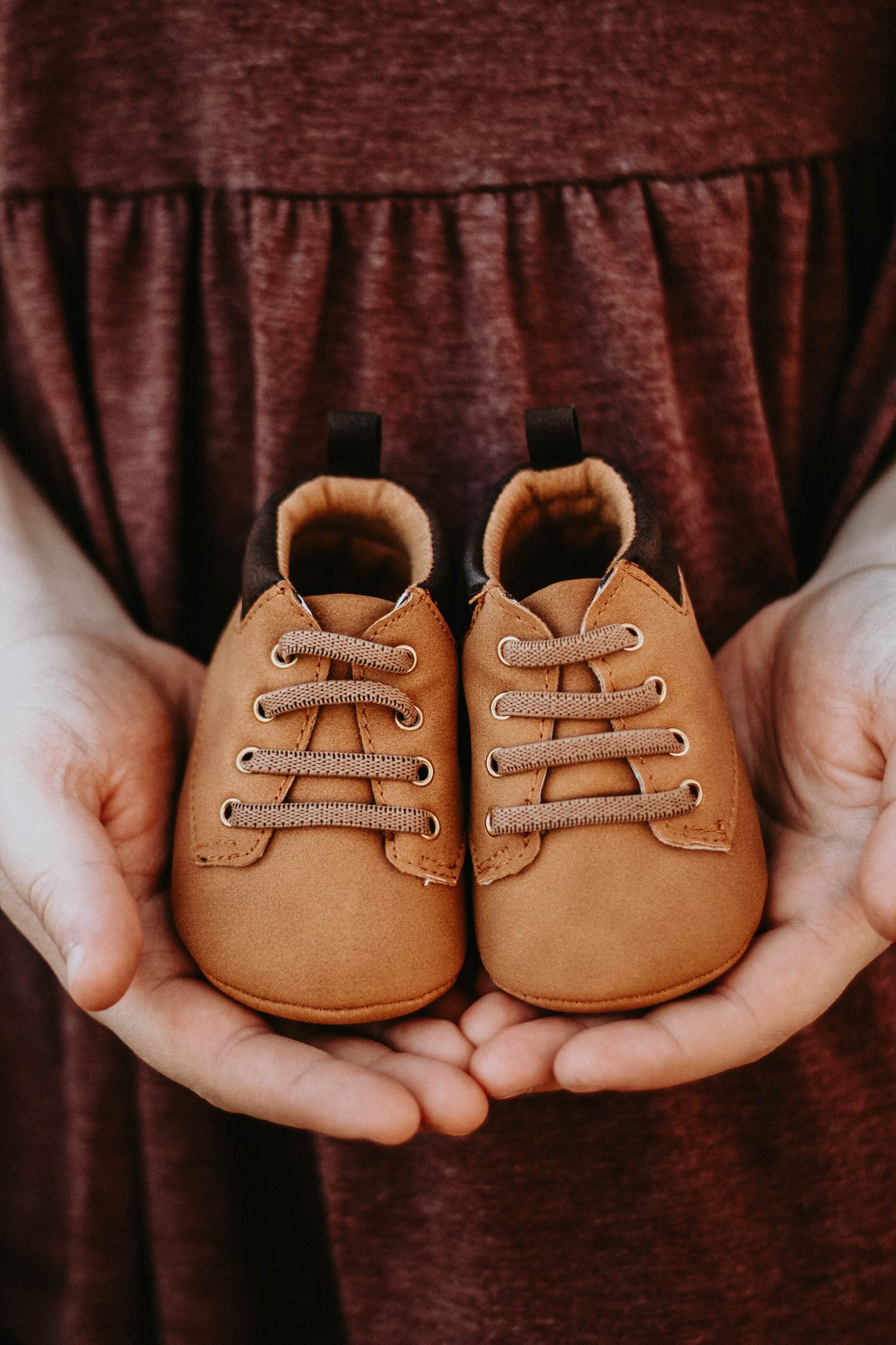 saint louis pregnancy announcement baby shoes
