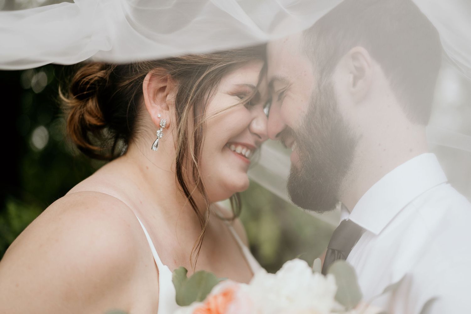 By The Clarks Wedding Photo Married Couple Smiles Light Tones