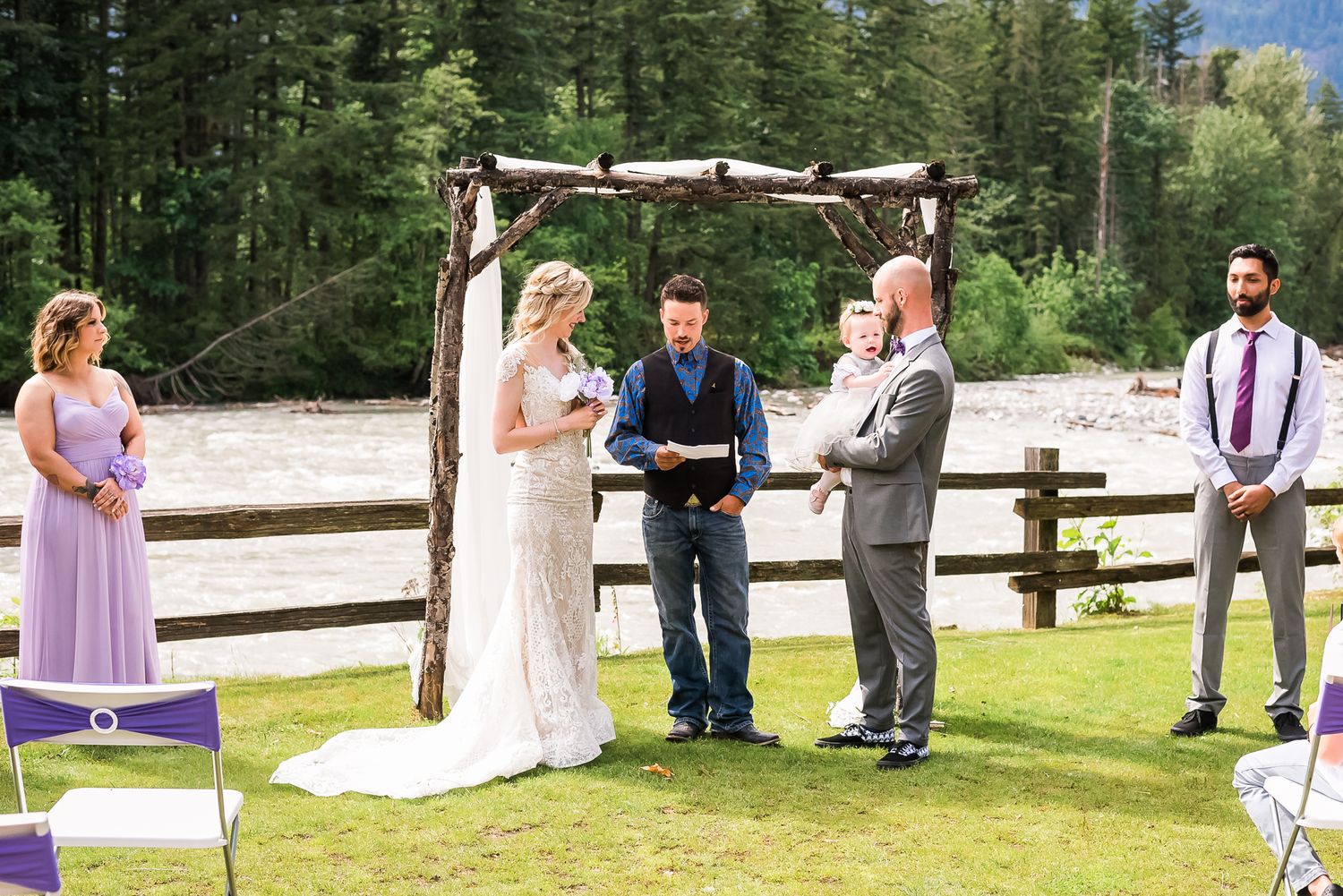 Beautiful scenic view during wedding ceremony at Hope Golf Course in Hope, B.C. Photo by Kari Mills Photography.