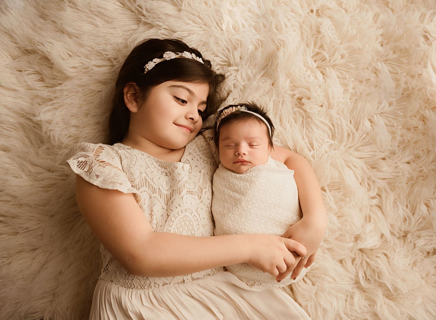newborn and sibling photos moreno valley, big sister holding baby girl