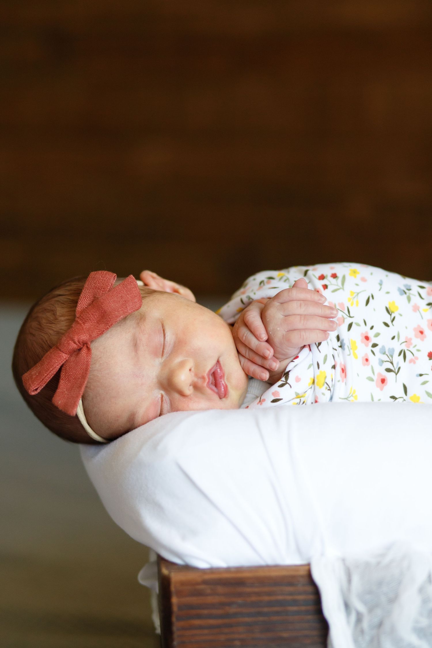 indoor newborn lifestyle session, tiny hands, pouty lips, button nose