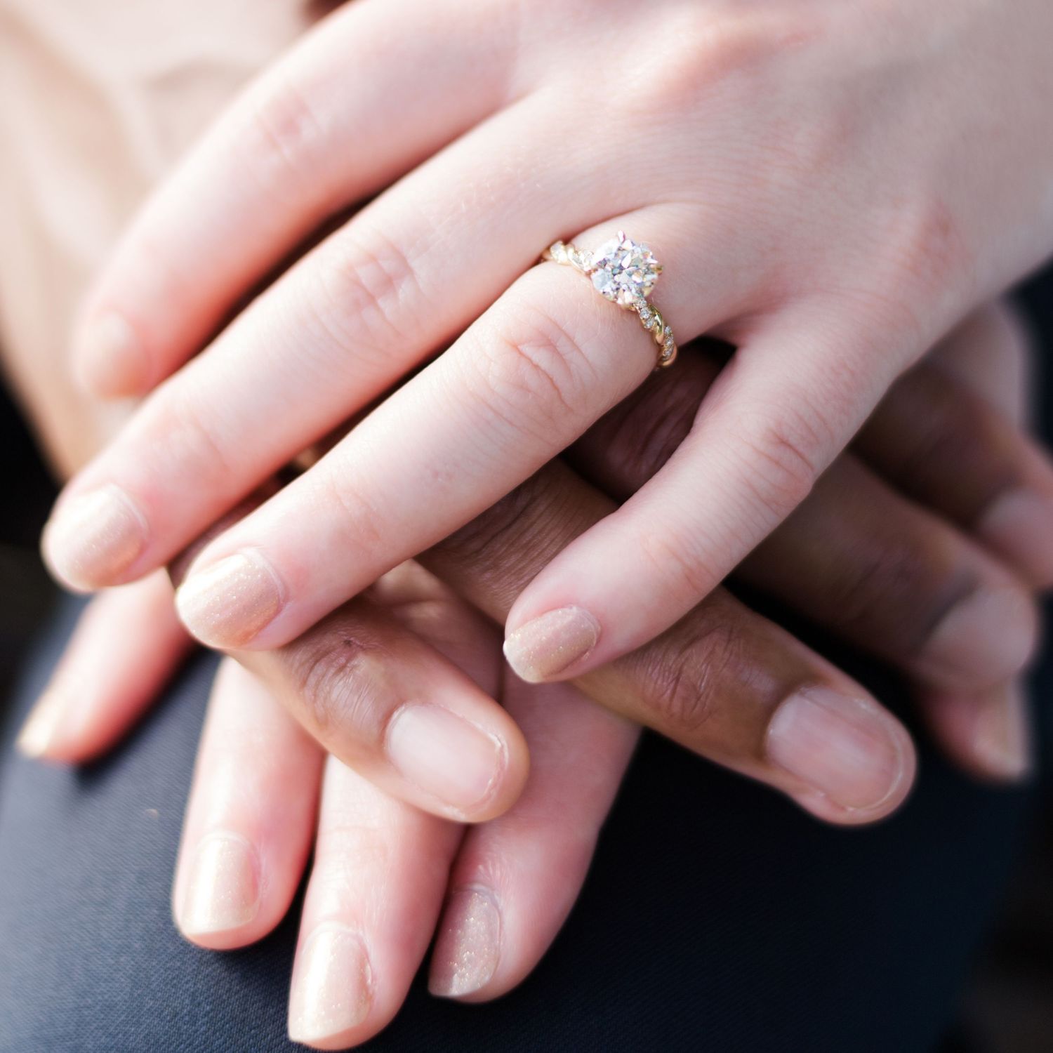 Indianapolis Indiana wedding photographer captures engagement ring photo with hands by Jayme Riggleman Photography
