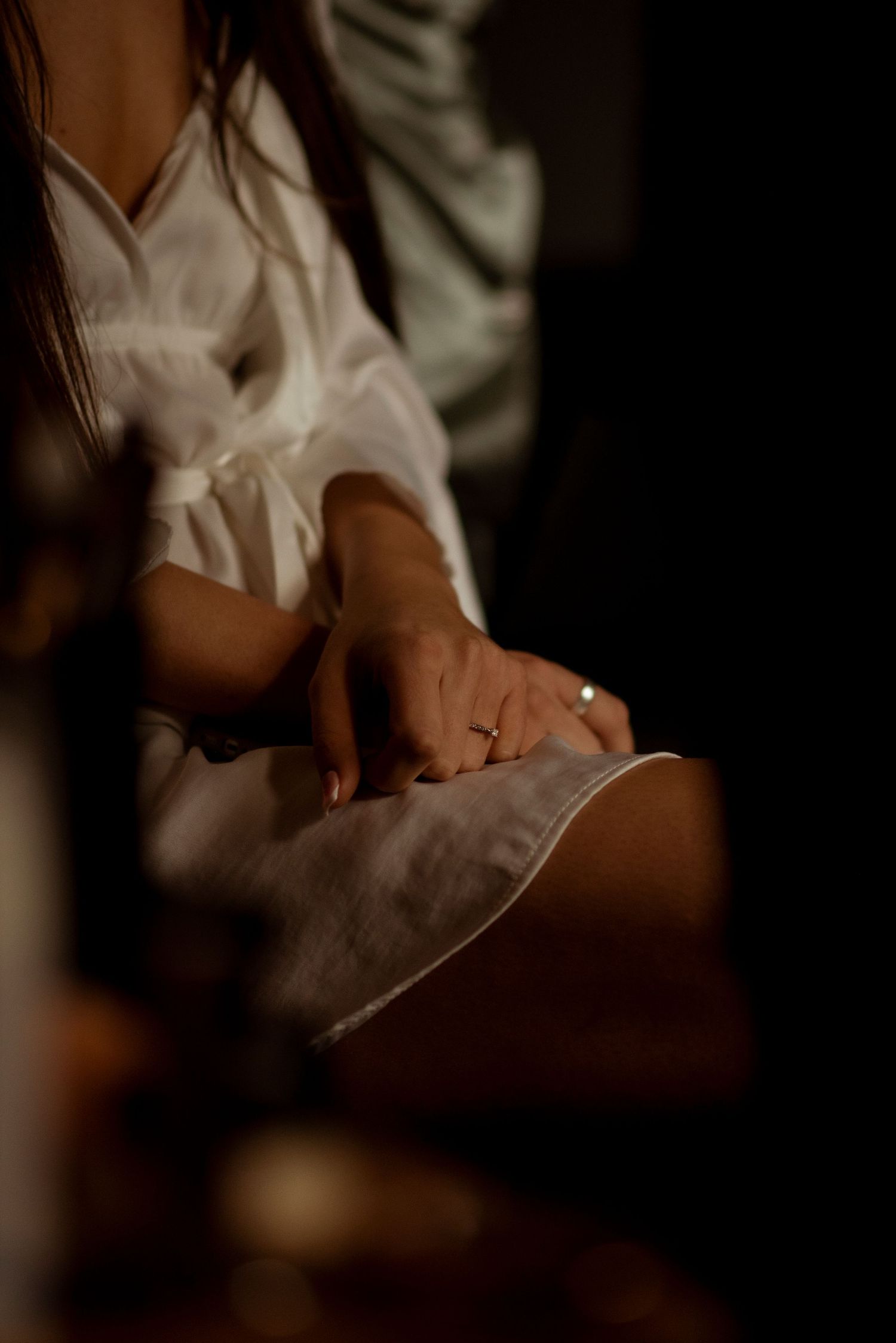 nervous brides hand during bridal prep