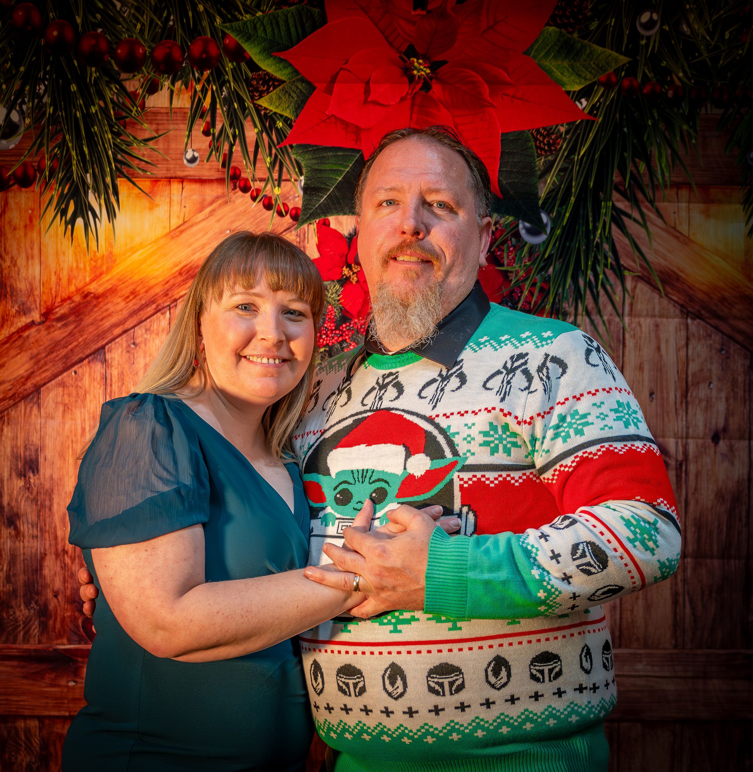 Holiday portraits featuring festive sweaters and decorative elements with warm lighting.
