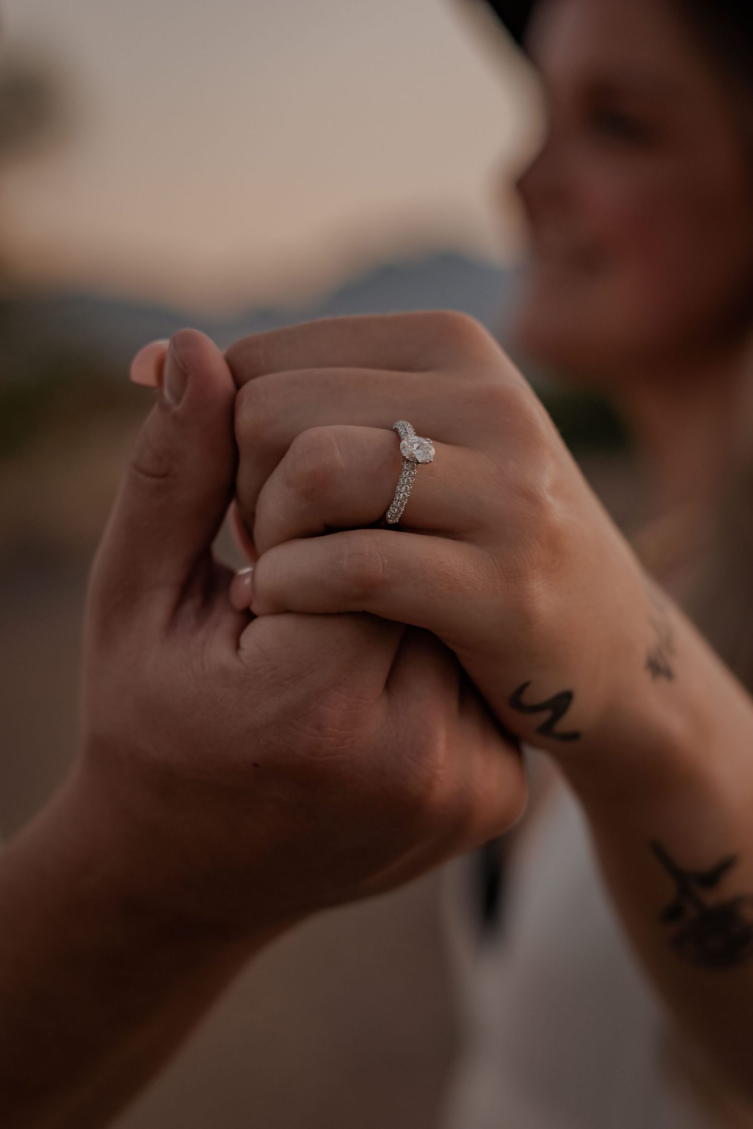 sunset photo of engagement ring detail shot
