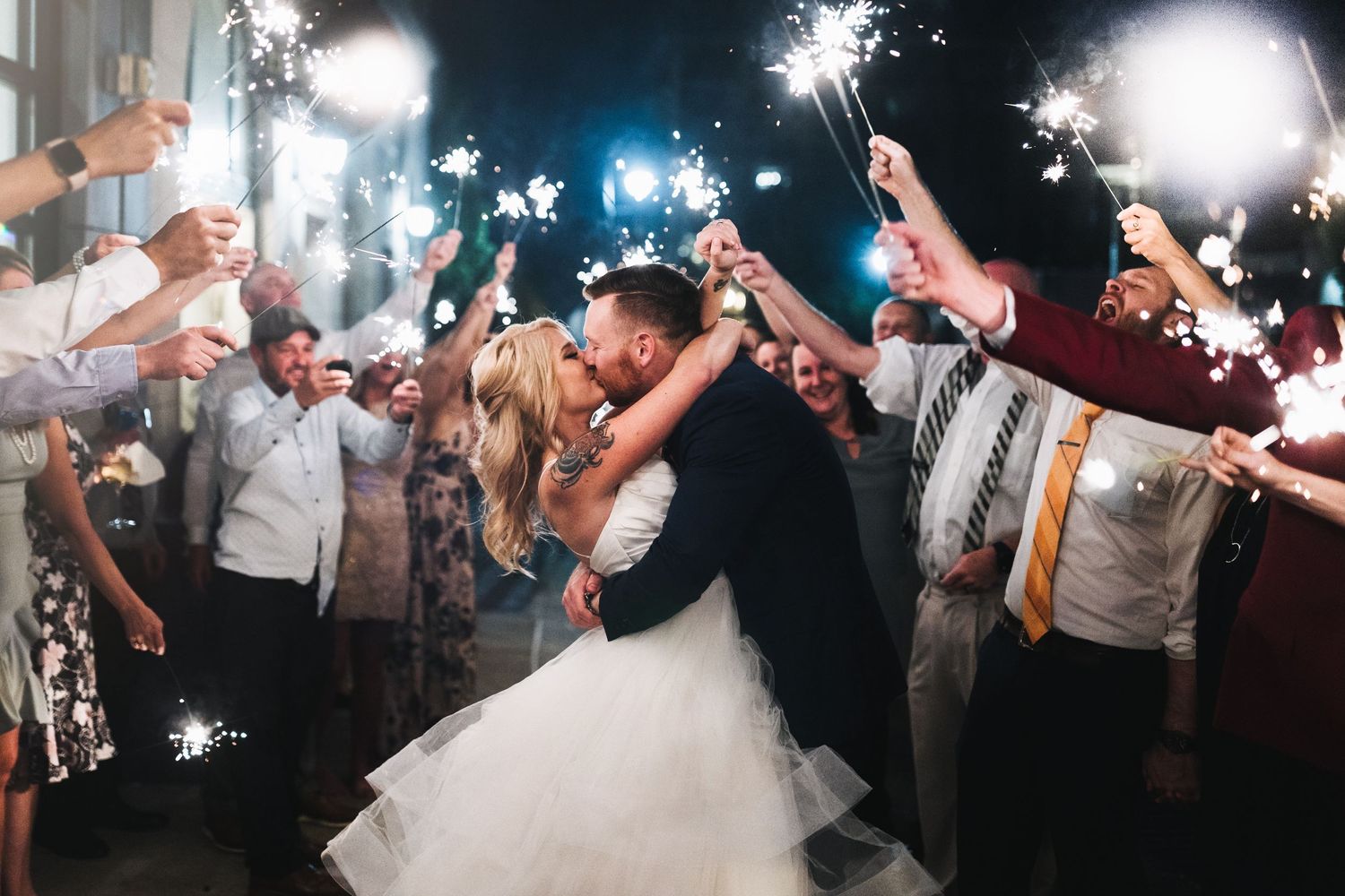 Wedding Sparkler exit in downtown of Asheville NC with the bride and groom