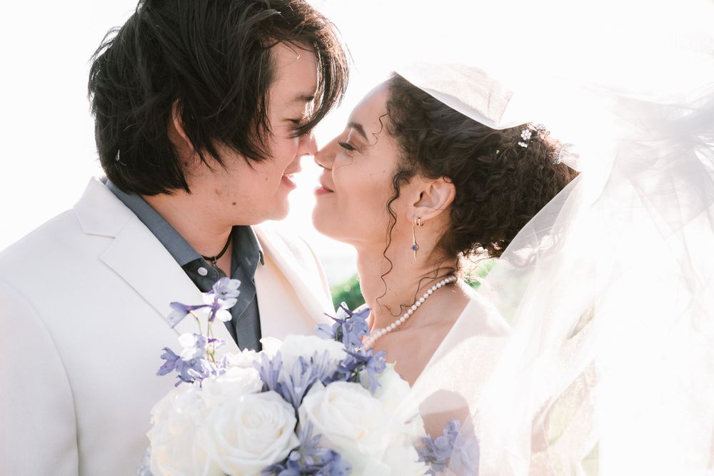 Melodie + Kevin Wedding Portrait - Veil Moment