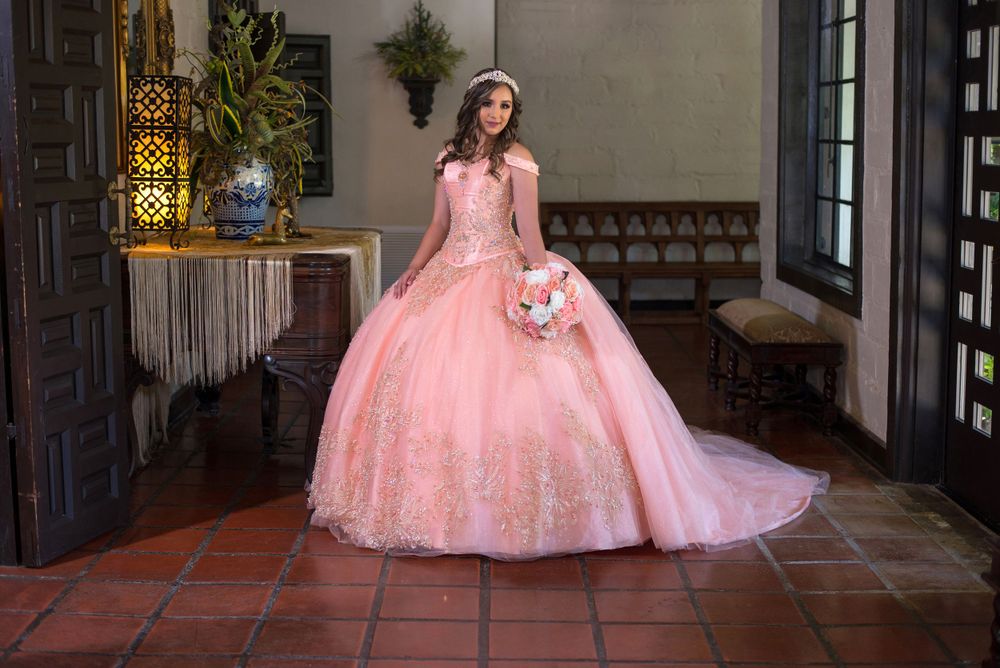 girl posing with quinceanera dress. La quinta mazatlan. McAllen, Texas. Wedding photography