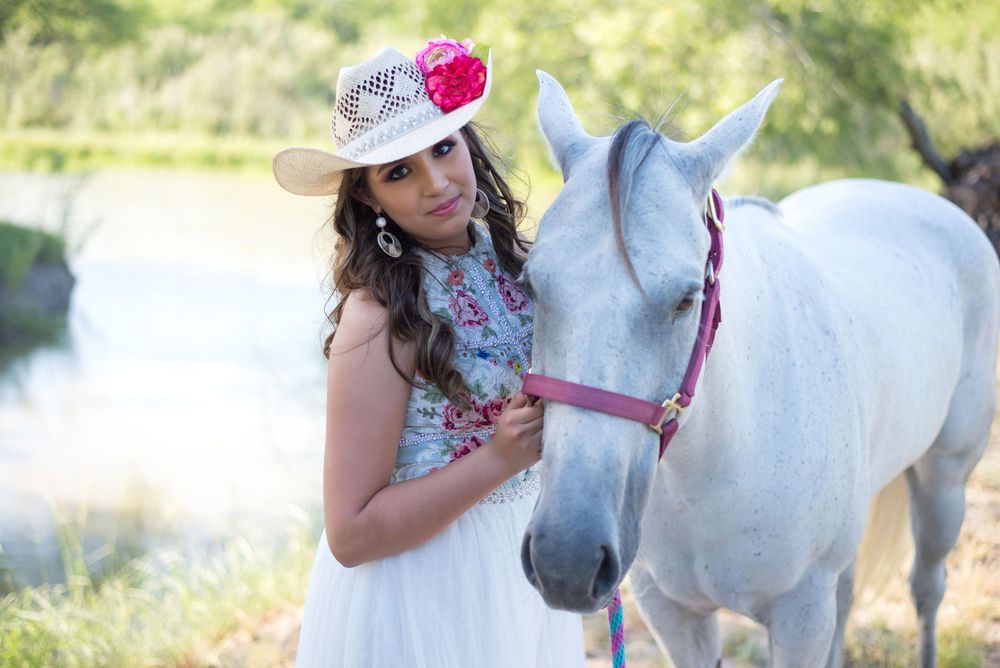 girl posing with a white horse. country ranch. McAllen, Texas. Wedding photography