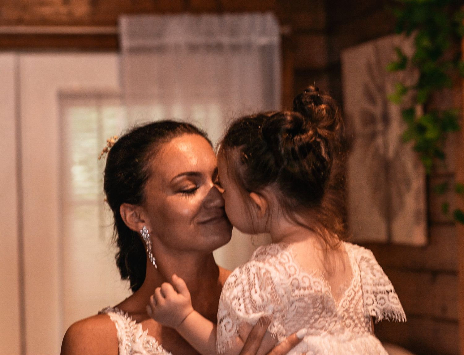 Mom and daughter - doing the eskimo kisses before the ceremony.