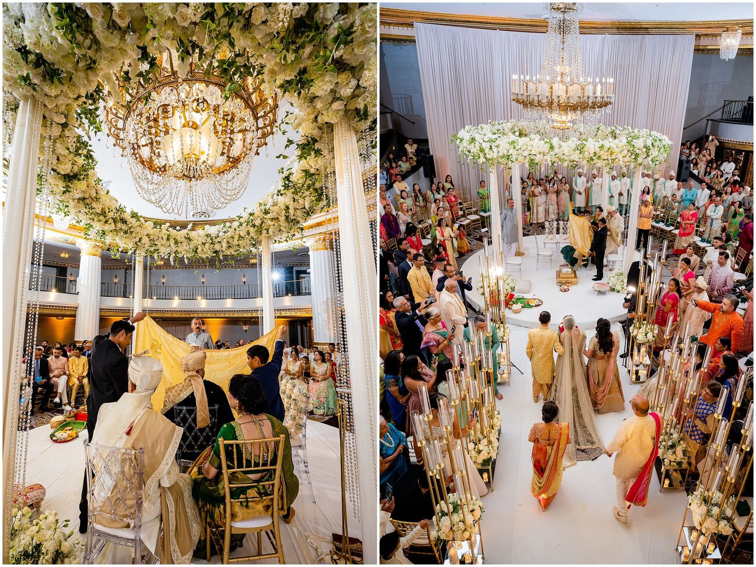 Grand wedding ceremony space with crystal chandeliers and floral ceiling installations surrounded by guests.