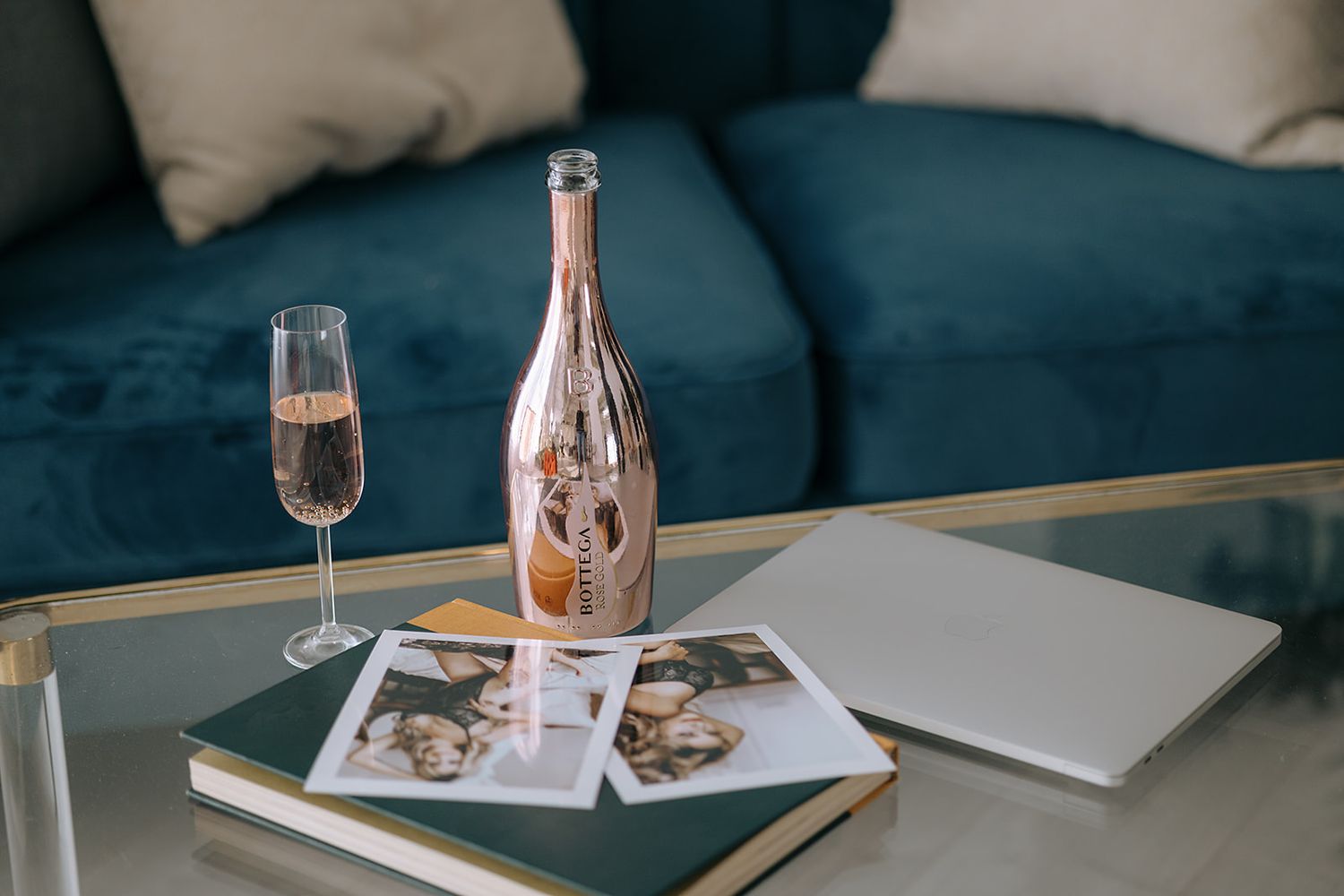 Champagne and luxury prints and albums sit at home. Luxury Boudoir Photographer Barrie
