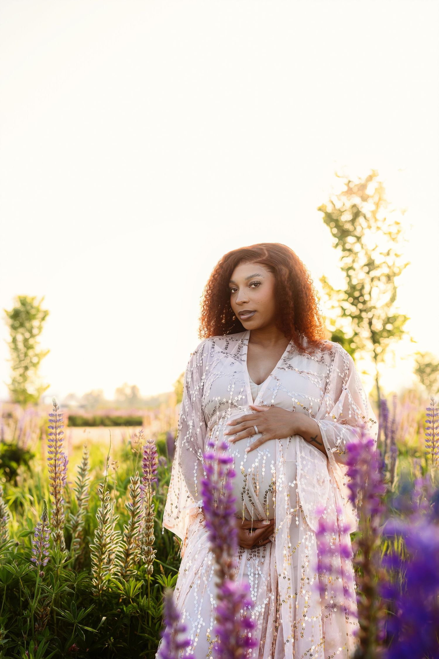 maternity session in a lupine field in Puyallup