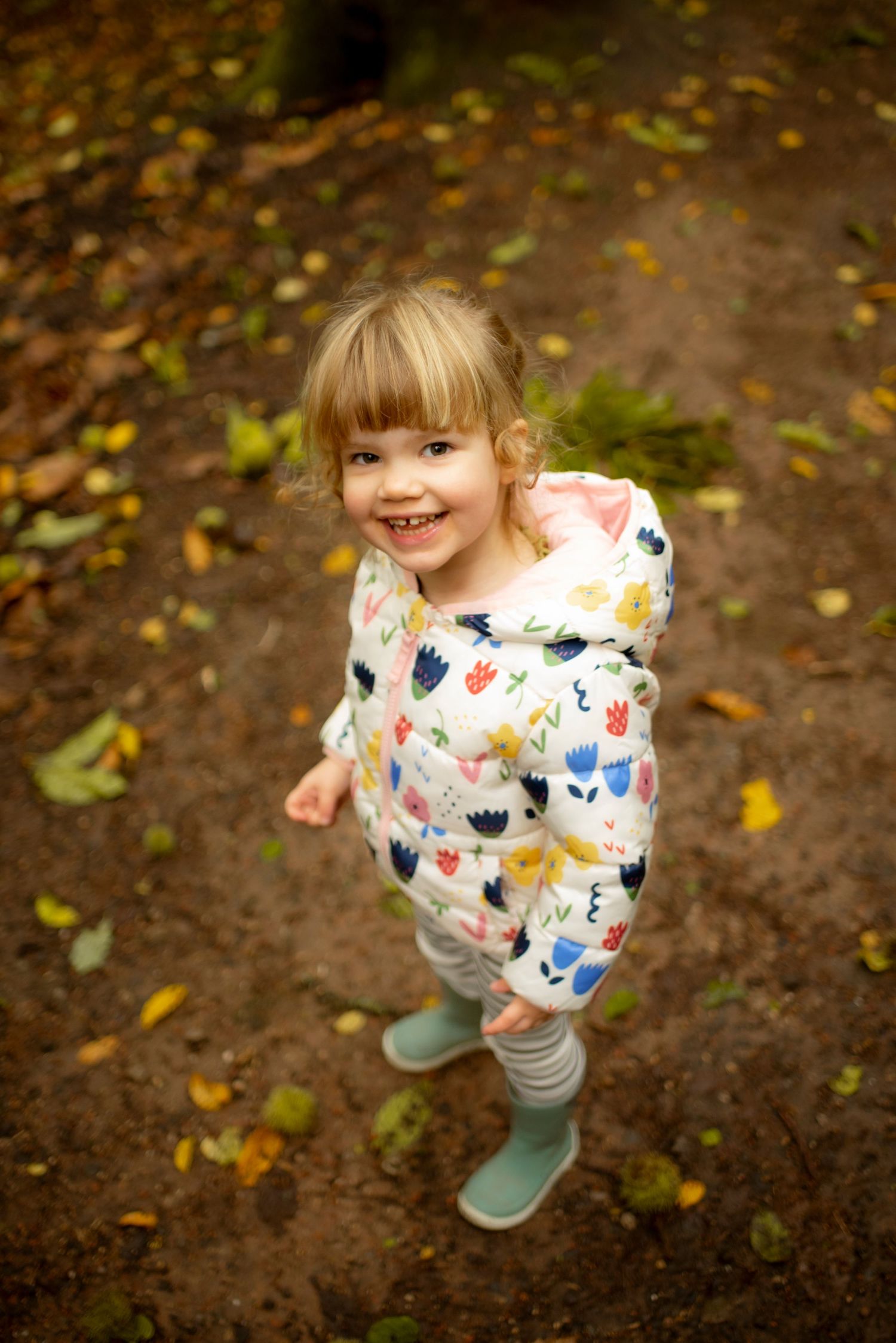 Happy toddler girl smiling at the camera