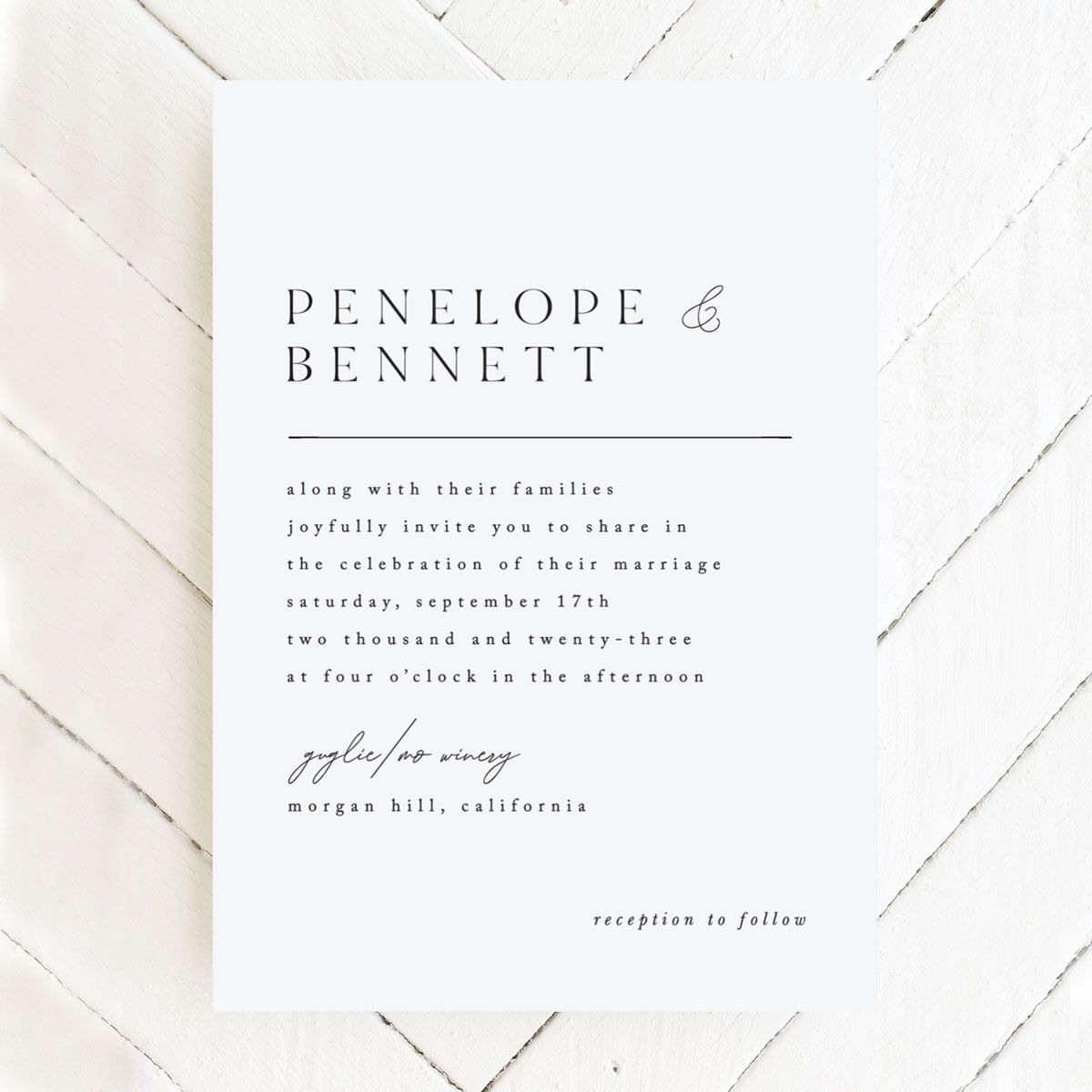 Elegant minimalist wedding invitation with gray text on white paper featuring Penelope and Bennett names against geometric background.