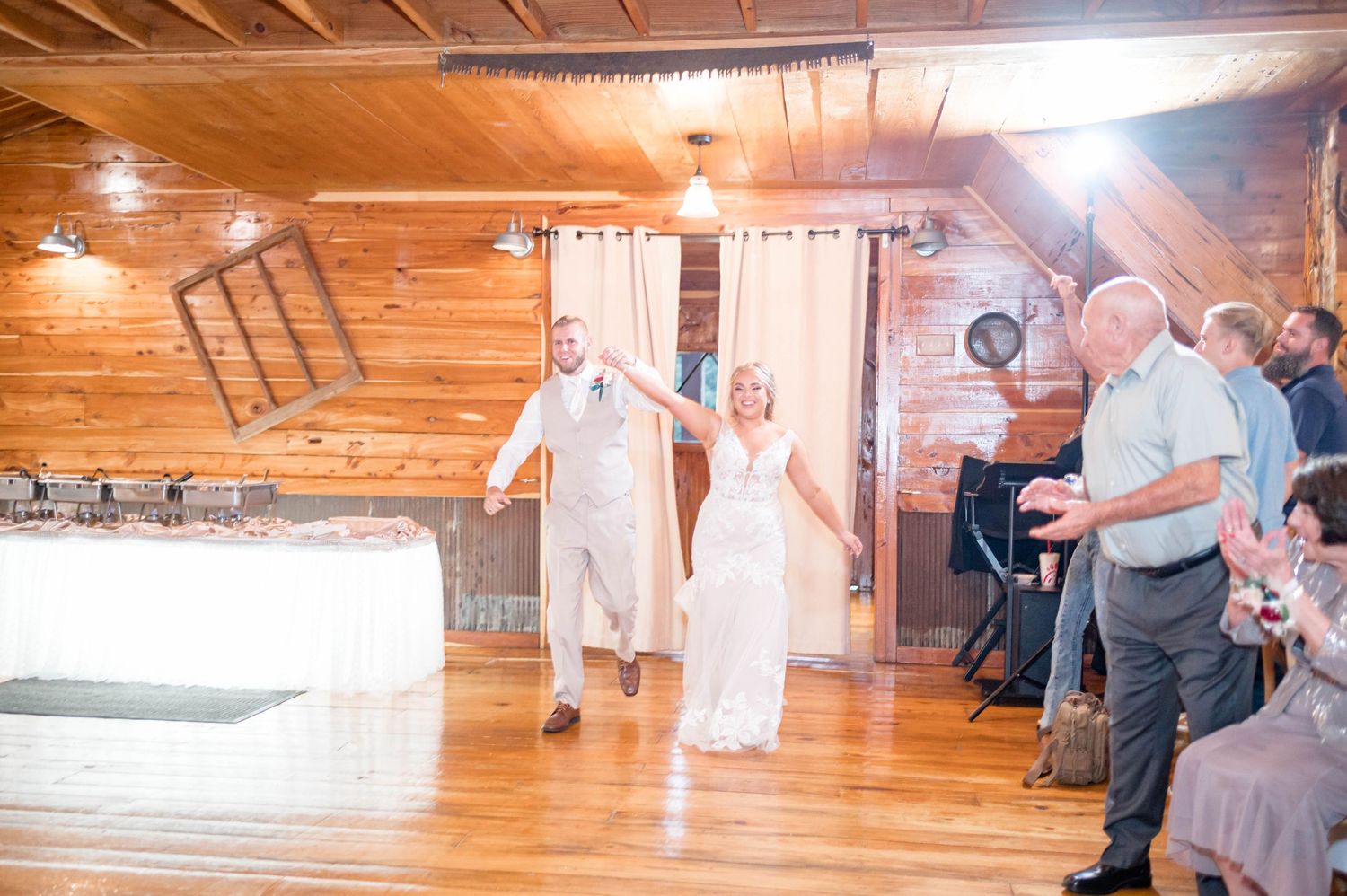 bride and groom entrance into reception