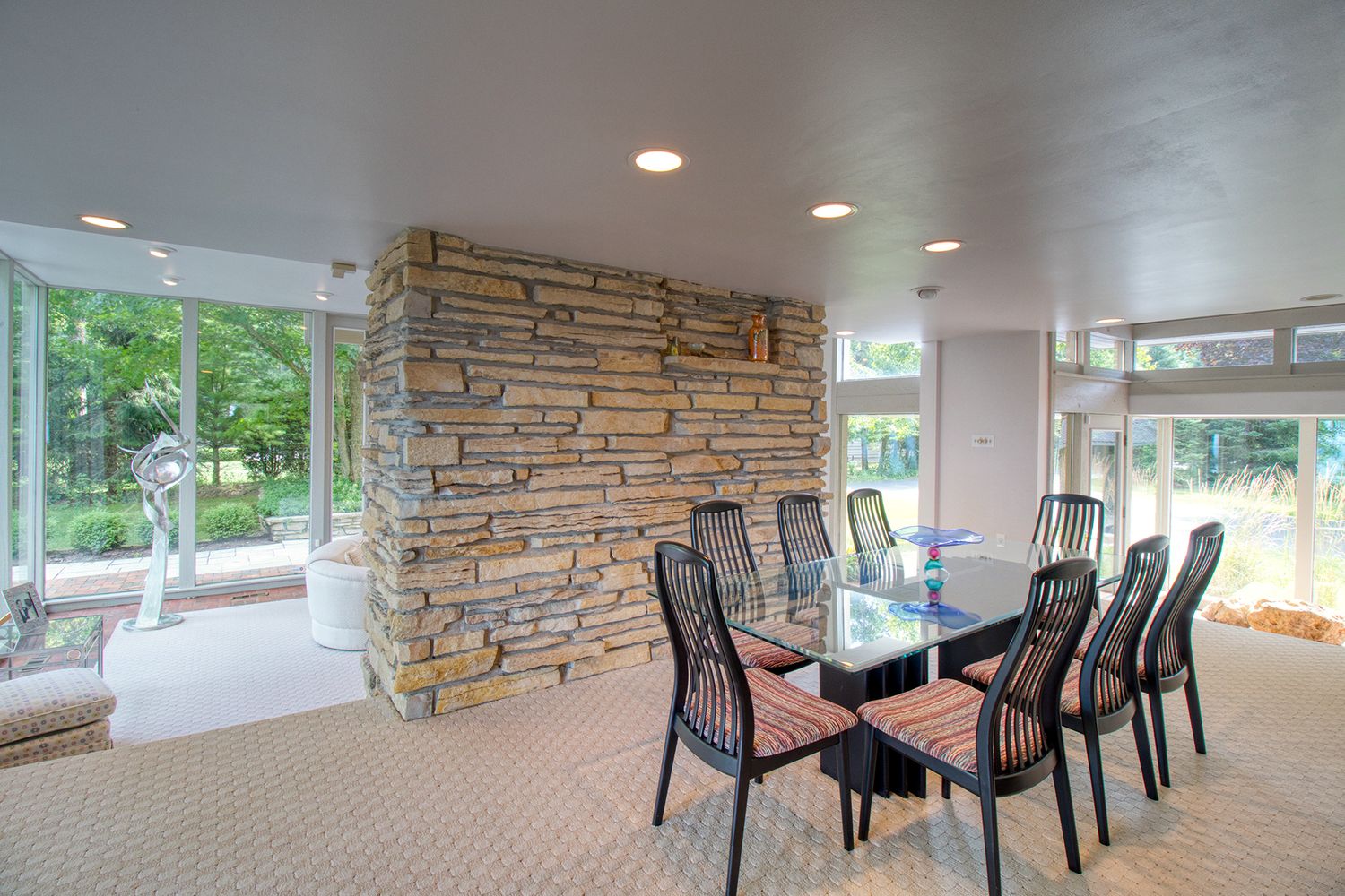 Dining room interior with stone accent wall, Wisconsin real estate photography