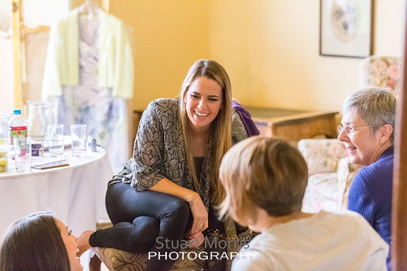 the girls sit around chatting during the bridal prep at sandon hall