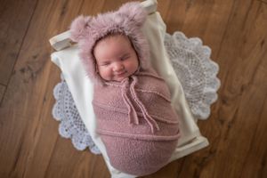 Pittsburgh newborn photography, baby girl in bear hat, in-home session