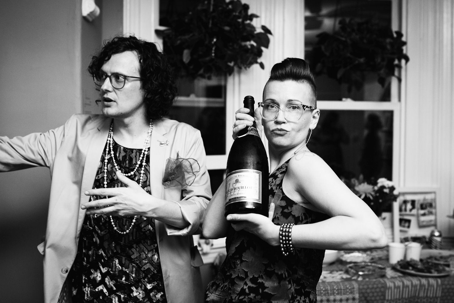 Philly couple serves champagne at their Civil Union celebration in a friend's home in Philly PA.