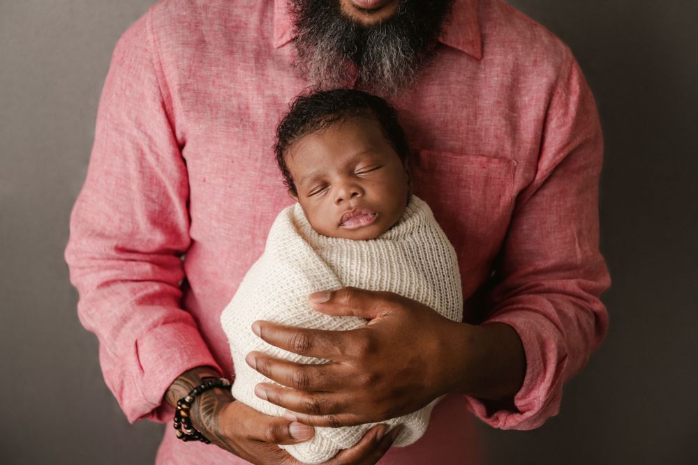 posed newborn portrait, studio newborn baby boy, parent or dad pose