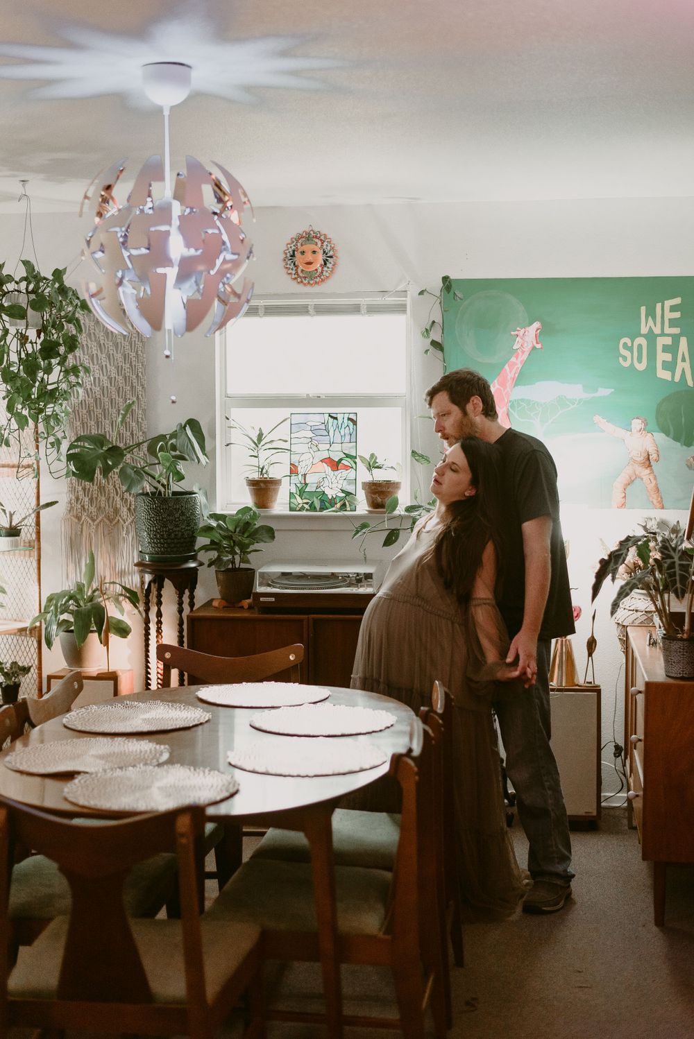 A Couple in Their Vintage and Retro Designed Home during a Maternity Session in Seguin, Texas