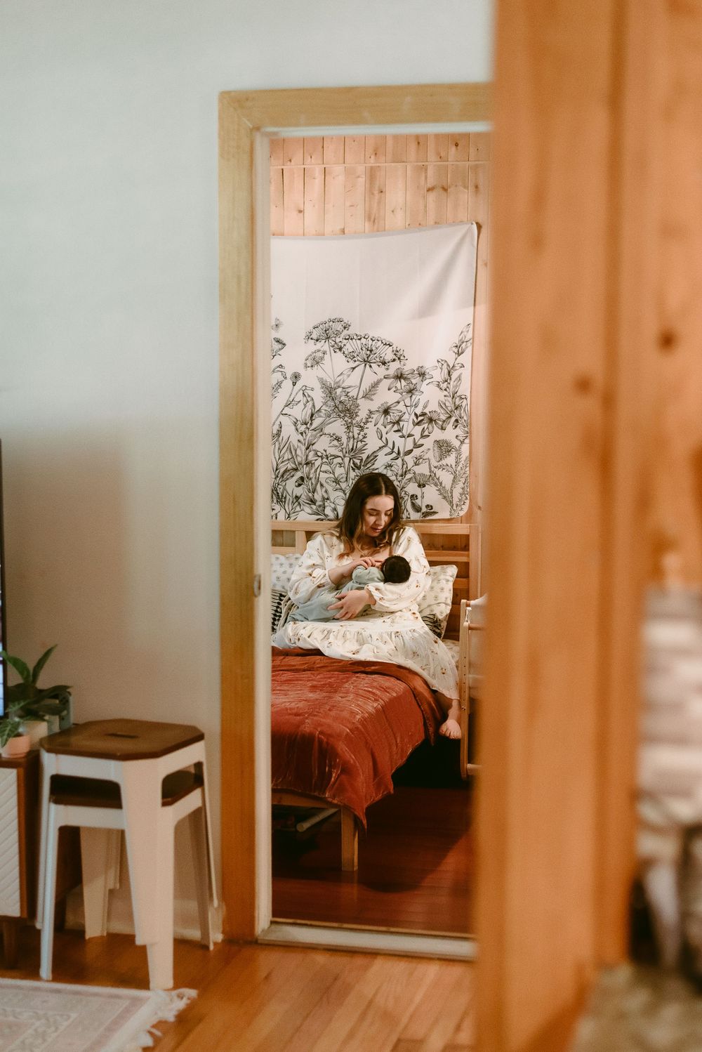 A Mother is Nursing her Newborn in their home in San Antonio, Texas