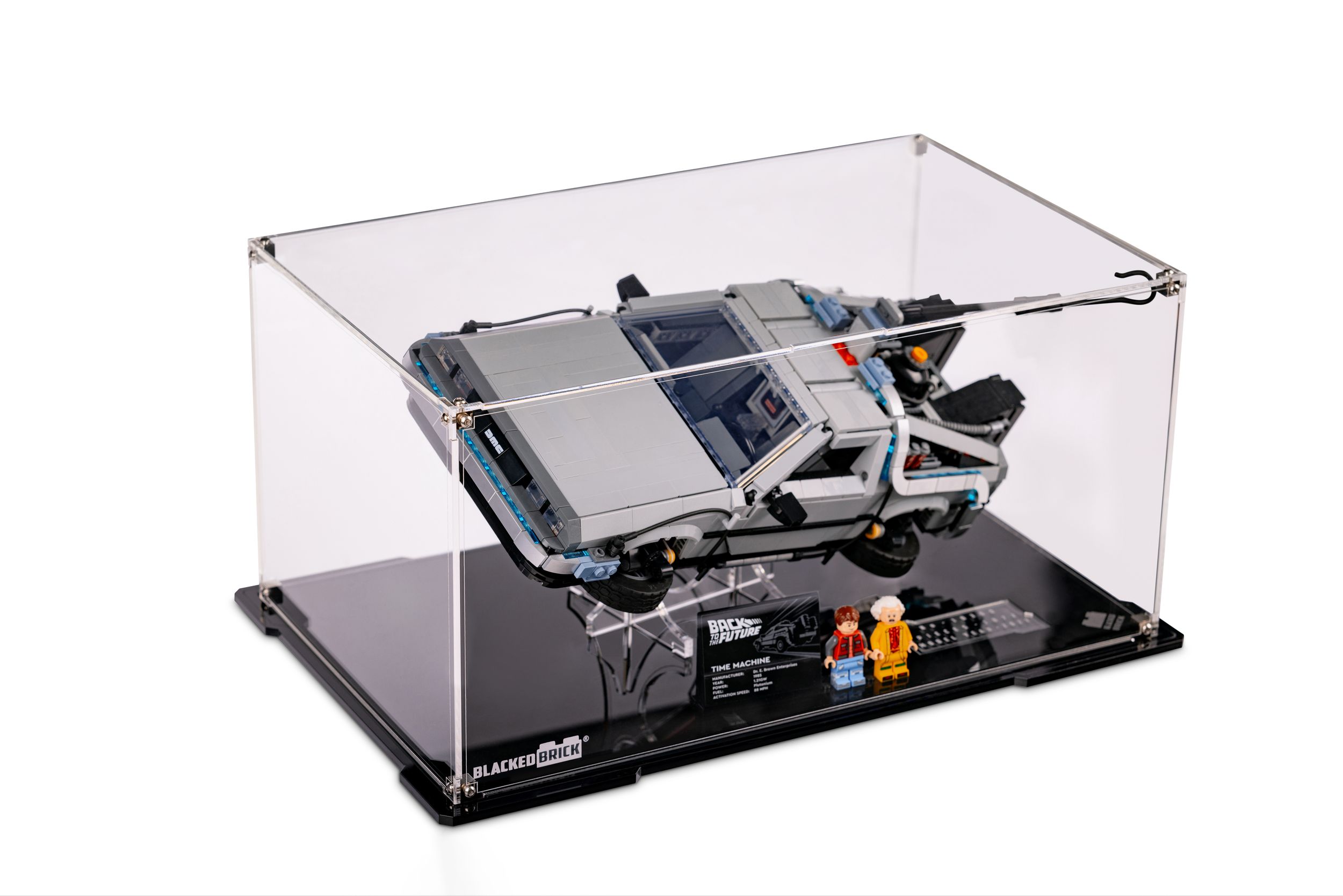 A DeLorean DMC-12 model car displayed in a clear protective display case.