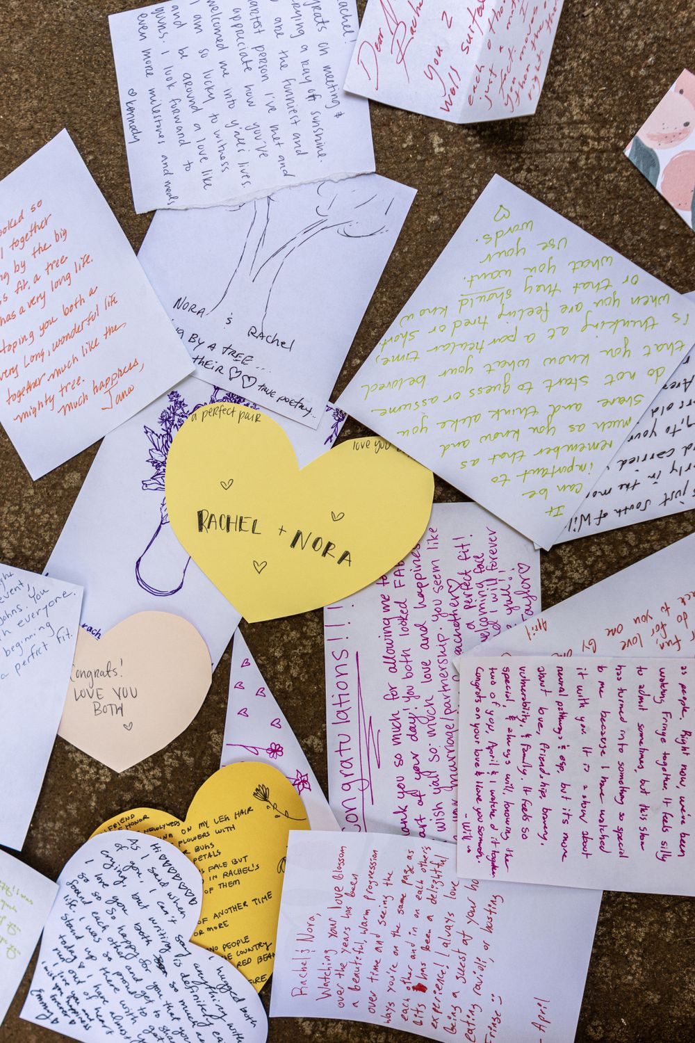 A spread of notes written to the wedding couple on their wedding day